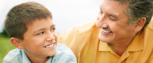 Father and Son Smiling